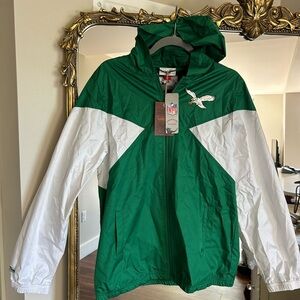 Never worn Phila Eagles windbreaker. Youth XL.